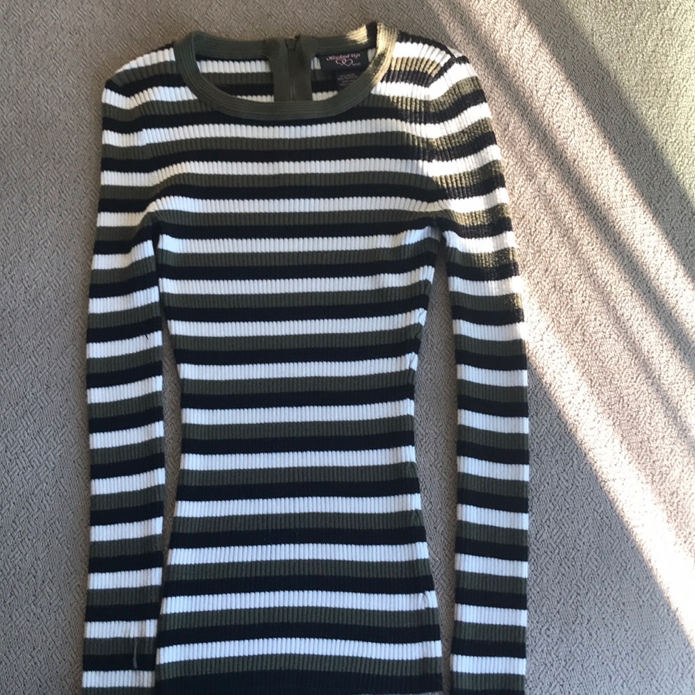 A long sleeve, striped, zipper back shirt